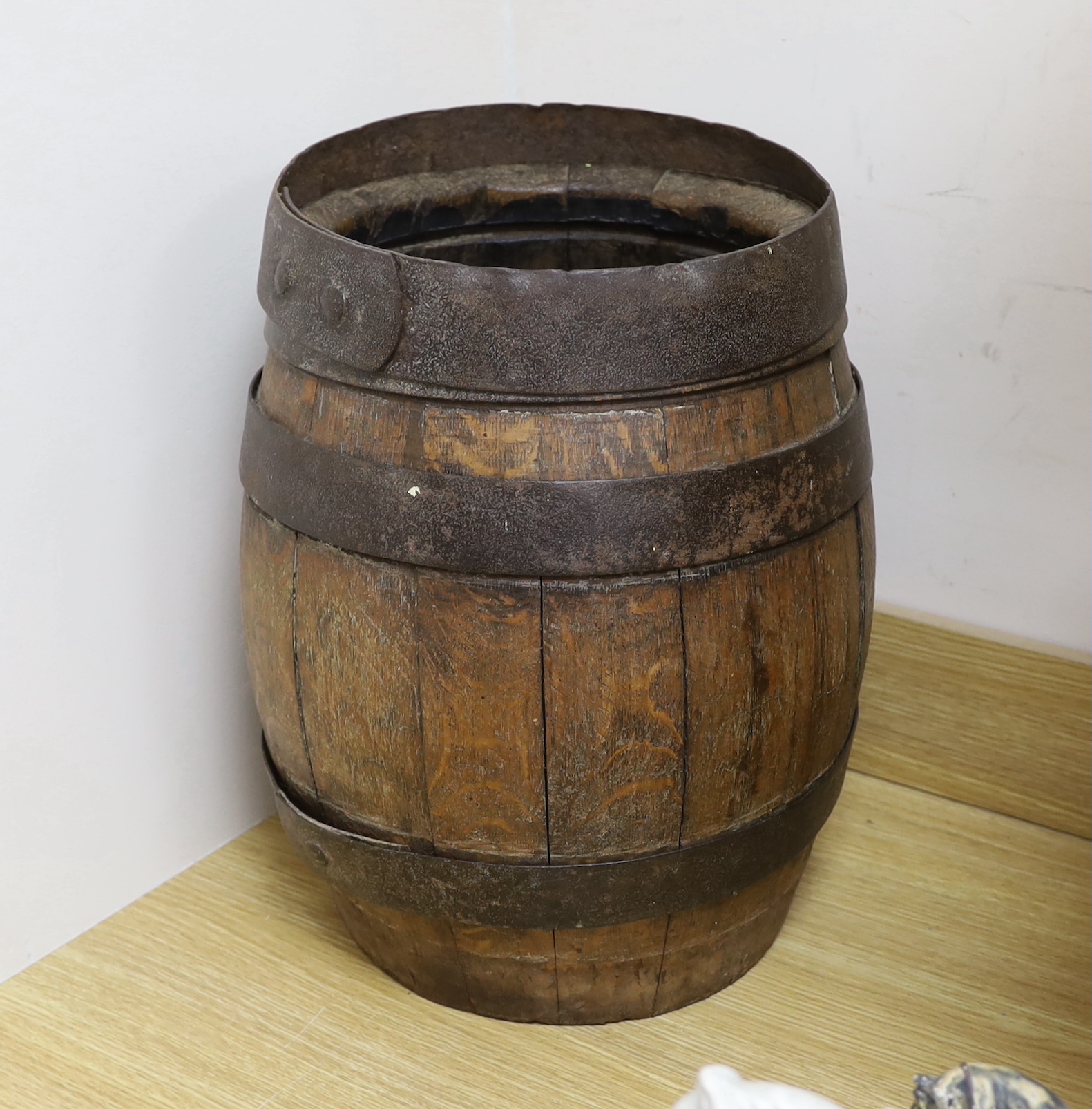 A wrought iron bound coopered oak barrel, 44cm